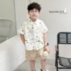 Set of grass pattern shirt with soft khaki shorts